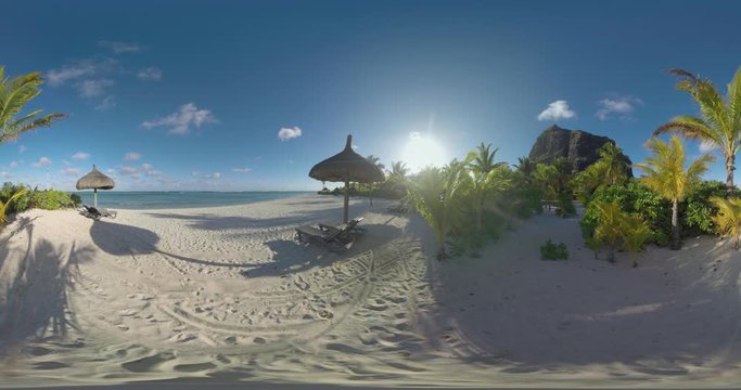 360 VR video. Vacation on tropical resort of Le Morne Brabant, Mauritius. Scene with ocean, beach and mountain in bright sunlight