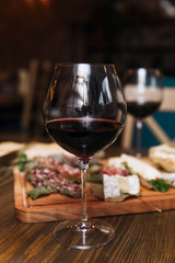 Cheese, sausages and red wine as an appetizer