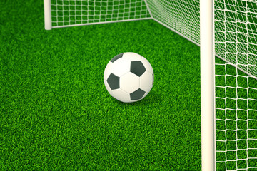 3d rendering of a football in the net on fresh green grass.