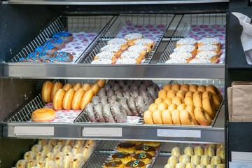 Variety of donuts on a shelf