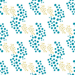 Seamless pattern of groups of dots on a white background.