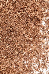 lots of brown wood saw dust