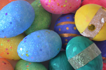Colorful bright easter egg background, multi-colored balls. out of focus, blurry