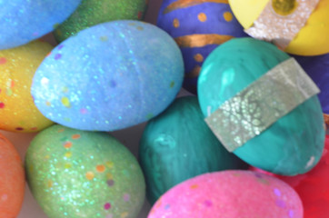 Colorful bright easter egg background, multi-colored balls. out of focus, blurry