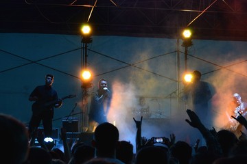 Fototapeta na wymiar Performance of rock of group on a scene.