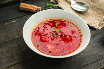 red tomato soup with vegetables (vegetarian food without meat) first course. top.  food background. copy space