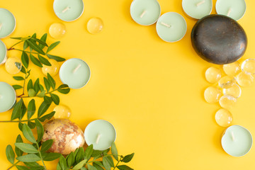 Spa treatment concept, flat lay composition with natural cosmetic products and massage brush, view from above, blank space for a text