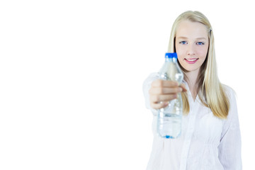 young woman giving a bottle of water.Isolated on white, copy space