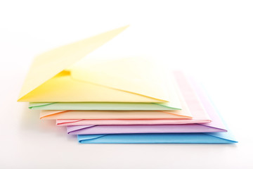 Colorful paper envelopes isolated on white background