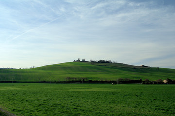 Fototapeta na wymiar landscape with green field,hill,horizon,agriculture,spring,rural,cloud,countryside,view