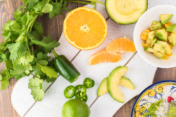 Ingredients for orange avocado salsa.