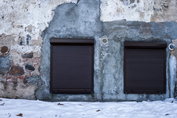 Windows in a old plaster wall