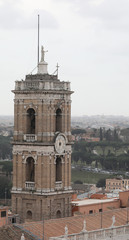 High clock tower of the town hall of Rome in Piazza del Campidog