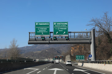 highway sign with the signs of the junction to go to Florence on