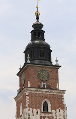 Fototapeta na wymiar bell tower of Krakow in Poland and the Church of Our Lady Saint