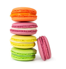 Stack of colorful french macaroons isolated on white