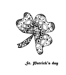 leaf clover with three leaves, decorated with floral ornaments in zentangle style.