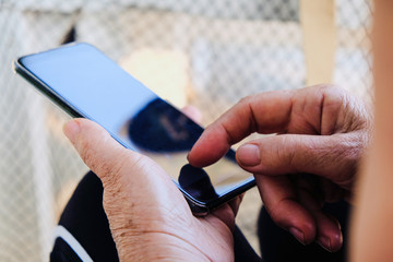 Old woman and smartphone