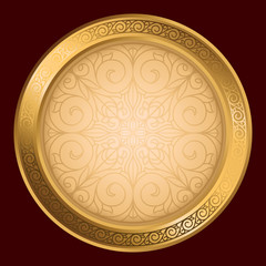 Golden ornate decorative emblem