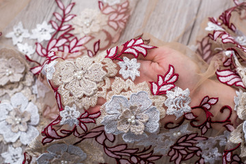 The texture of lace on wooden background