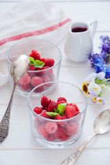 Fresh Organic Raspberries in glasses for Breakfast 