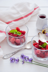 Fresh Organic Raspberries in glasses for Breakfast 