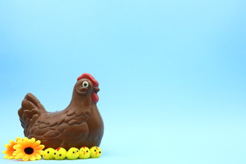 Funny Easter Composition with Chocolate Hen