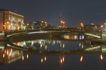 Sadovnichesky bridge and Moscow city had been reflected in the water of Vodootvondy canal