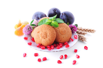 Fototapeta na wymiar Healthy foods. Oatmeal Cookies, Mint, Pomegranate, Plum, Wheat Ears, Mandarins