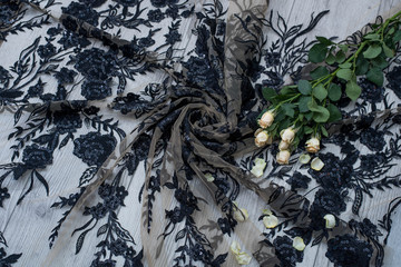 The texture of lace on wooden background