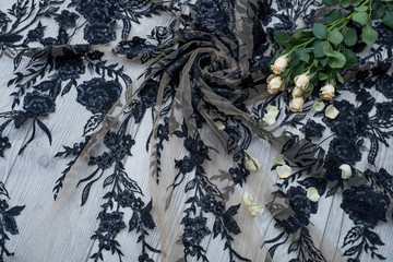 The texture of lace on wooden background