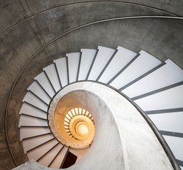 Empty interior spiral modern concrete stairs