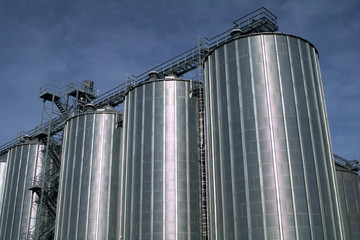 silos and blue sky,industry, silo, storage, tank, factory, steel, metal, structure, grain, agriculture, building, container, plant, 