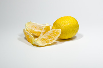 Juicy yellow lemon on a white background