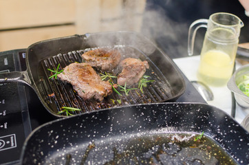 Grilled steaks on the pan 