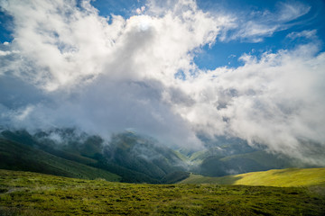 Landscape of Borzhava ridge of the Ukrainian Carpathian Mountains. Clouds above Carpathians