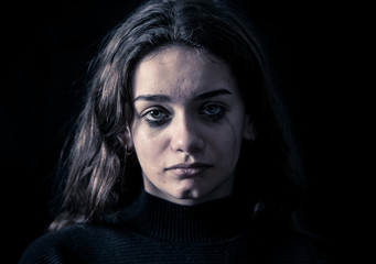 Portrait of sad, unhappy young girl crying. Helpless, depressed child. Stop bullying campaign