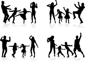 Happy family. Dancing silhouettes.