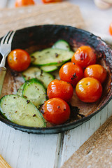 Fresh and juicy roasted tomatoes and cucumbers.