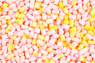 Marshmallow. Background of pink and yellow colorful mini marshmallows.