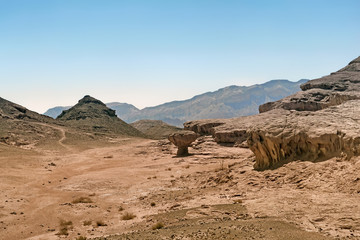 Fototapeta na wymiar Lifeless landscape in Negev Desert of Israel.