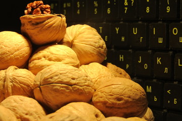 walnuts with letters on background