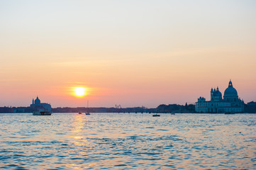Naklejka premium Amazing sunset in Venice with view on cathedral Santa Maria della Salute.