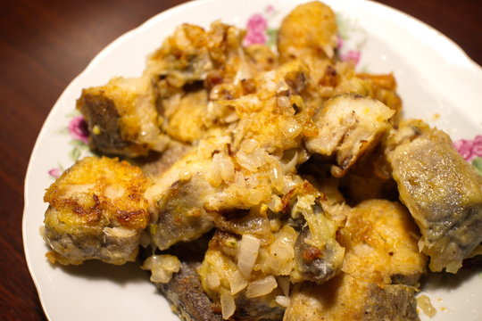 fried fish pieces in a plate