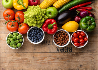 Healthy eating ingredients: fresh vegetables, fruits and superfood. Nutrition, diet, vegan food concept