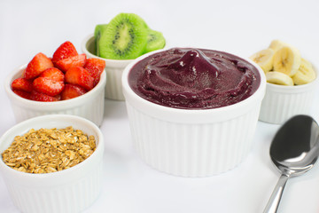 Brazilian acai and fruits in white background