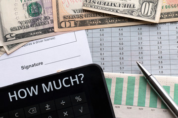 Fototapeta premium Money, calculator and document with place for signature. Goals, plans, intention.