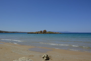 Fototapeta na wymiar a small island in the blue sea