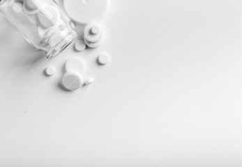 Assorted pharmaceutical medicine pills, tablets white color.Pills background.