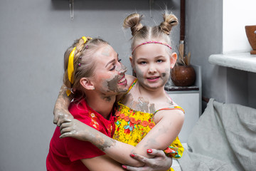 master class in a pottery workshop for a family